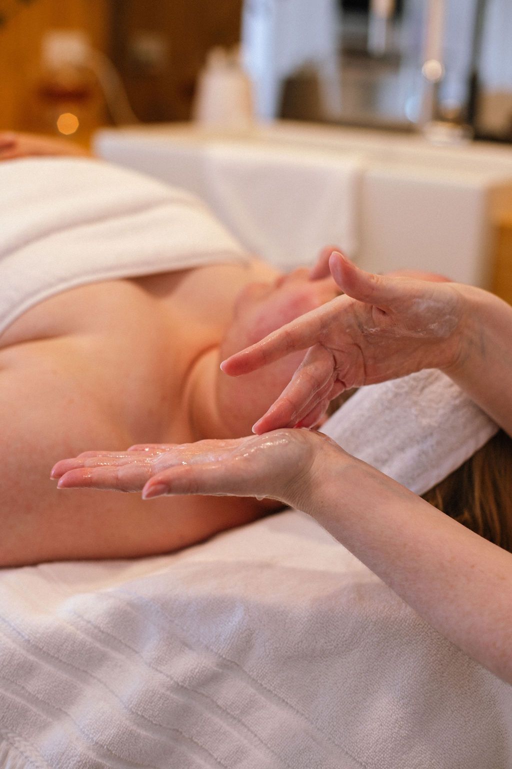 A client resting peacefully during a treatment in The Cocoon.